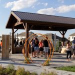 families enjoying an event near the Hops Garden Pavilion